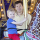 Illustration for article titled Pathetic 4-Year-Old Needs Father To Stand On Merry-Go-Round Platform For Entire Ride